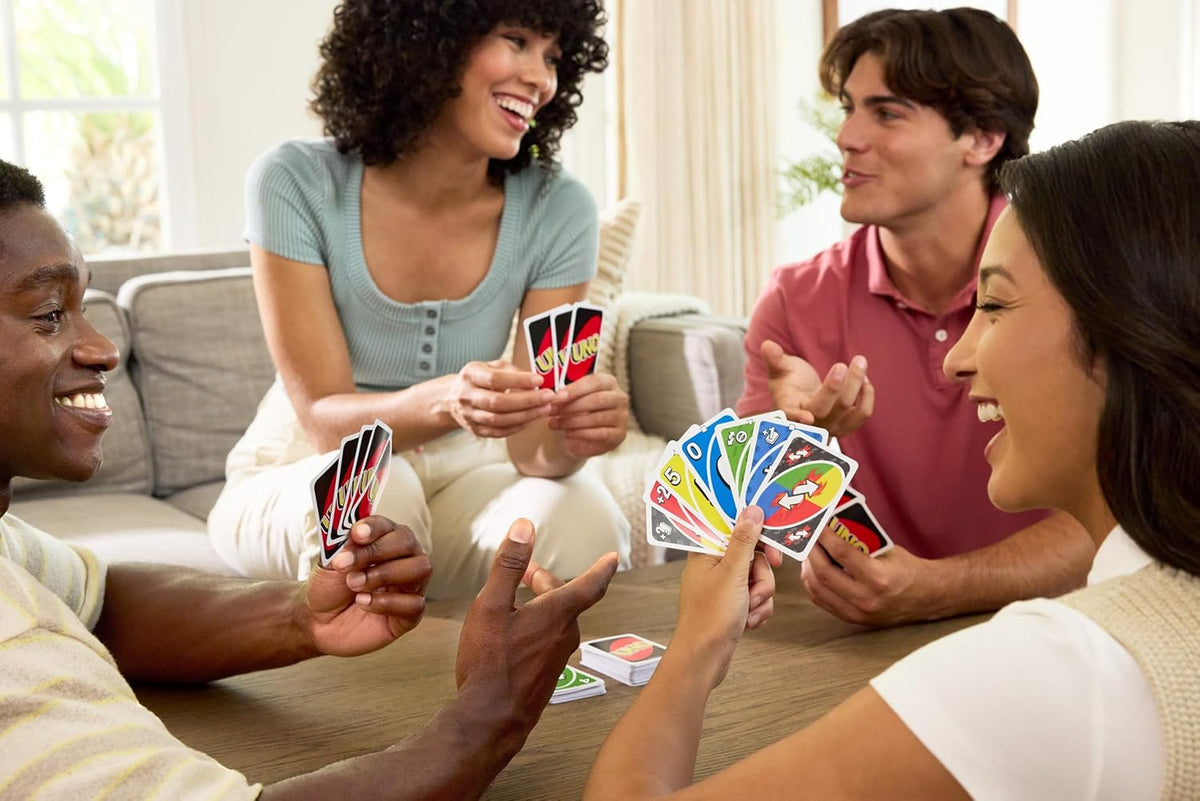 Mattel Games UNO Card Game with 2 Add On Packs with Storage Tin